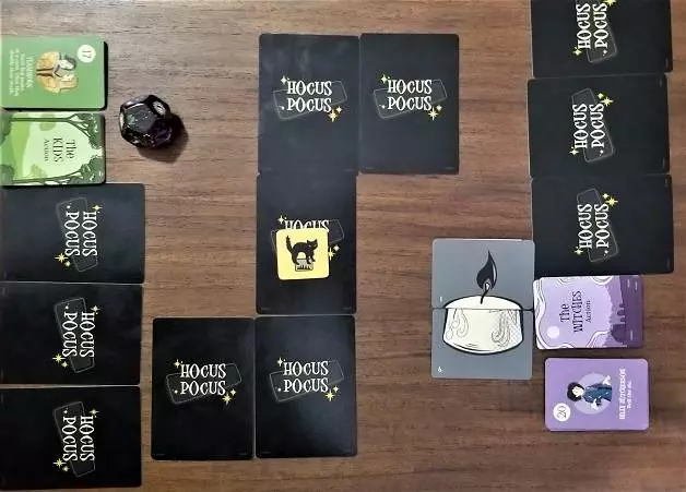 A photo demonstrating an example of mid-game during a session of of Hocus Pocus: Tricks & Wits from Funko Games